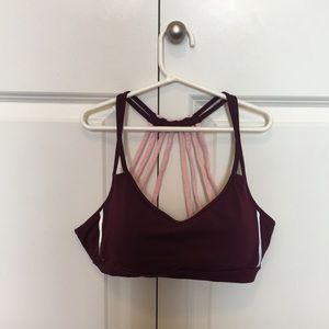 pink and maroon sports bra
